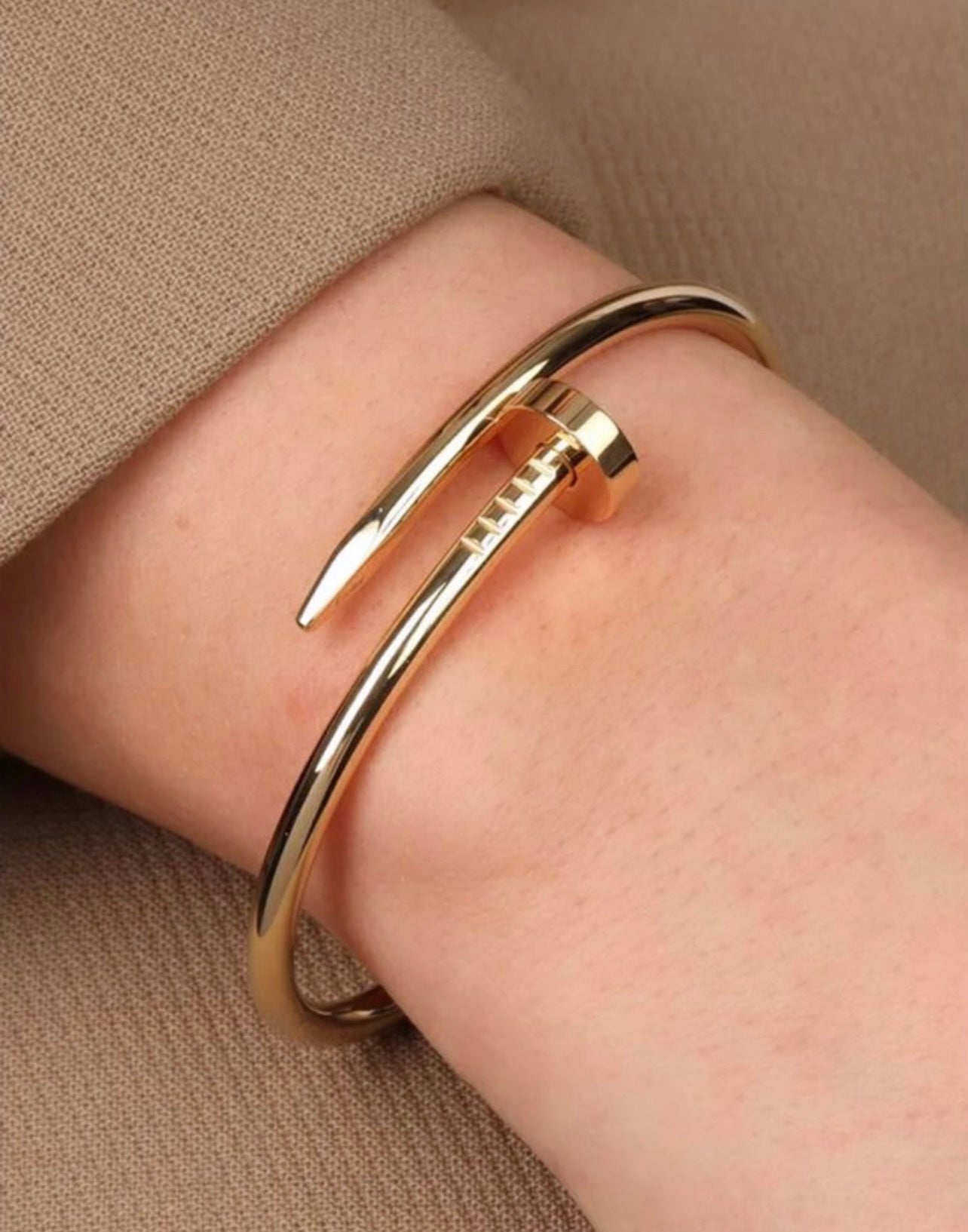 Gold nail bracelet