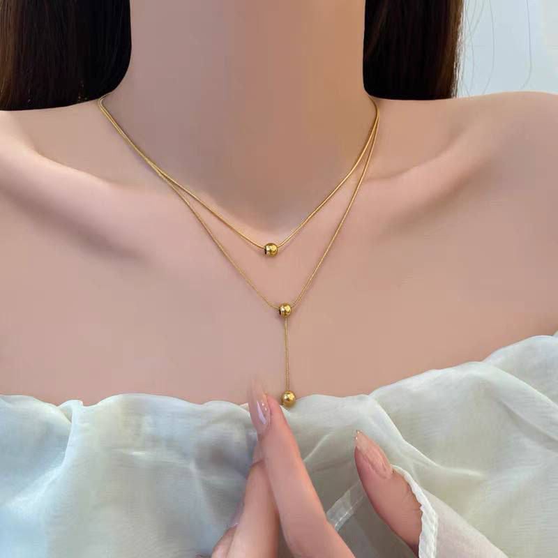 Double layered gold bead necklace