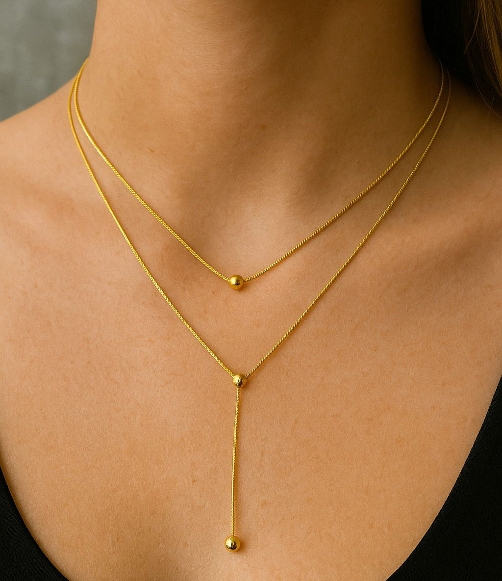 Double layered gold bead necklace